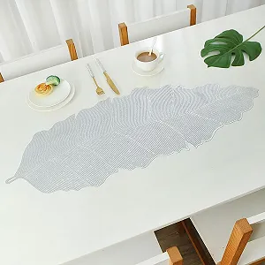 Ранер для столу PVC Banana Leaves Non-Slip 13 x 36 дюймів Сріблястий ціна на synthetic.ua - Фото 1 Ранер для столу PVC Banana Leaves Non-Slip 13 x 36 дюймів Сріблястий synthetic.ua - Фото 1