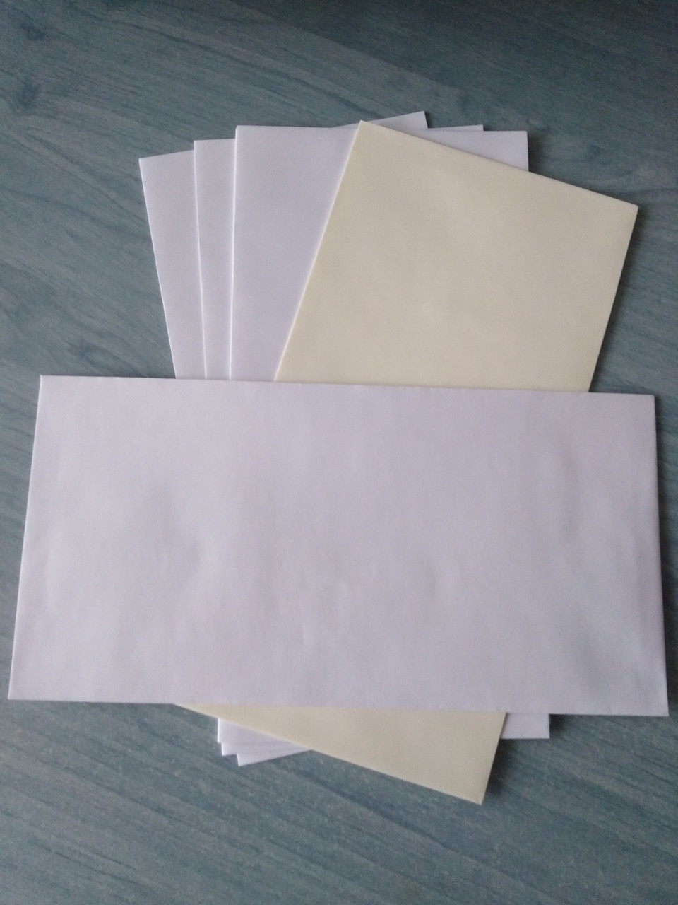 Белые бумажные конверты для открыток размером 22×11 см. Упаковка по 10 шт., фото №1