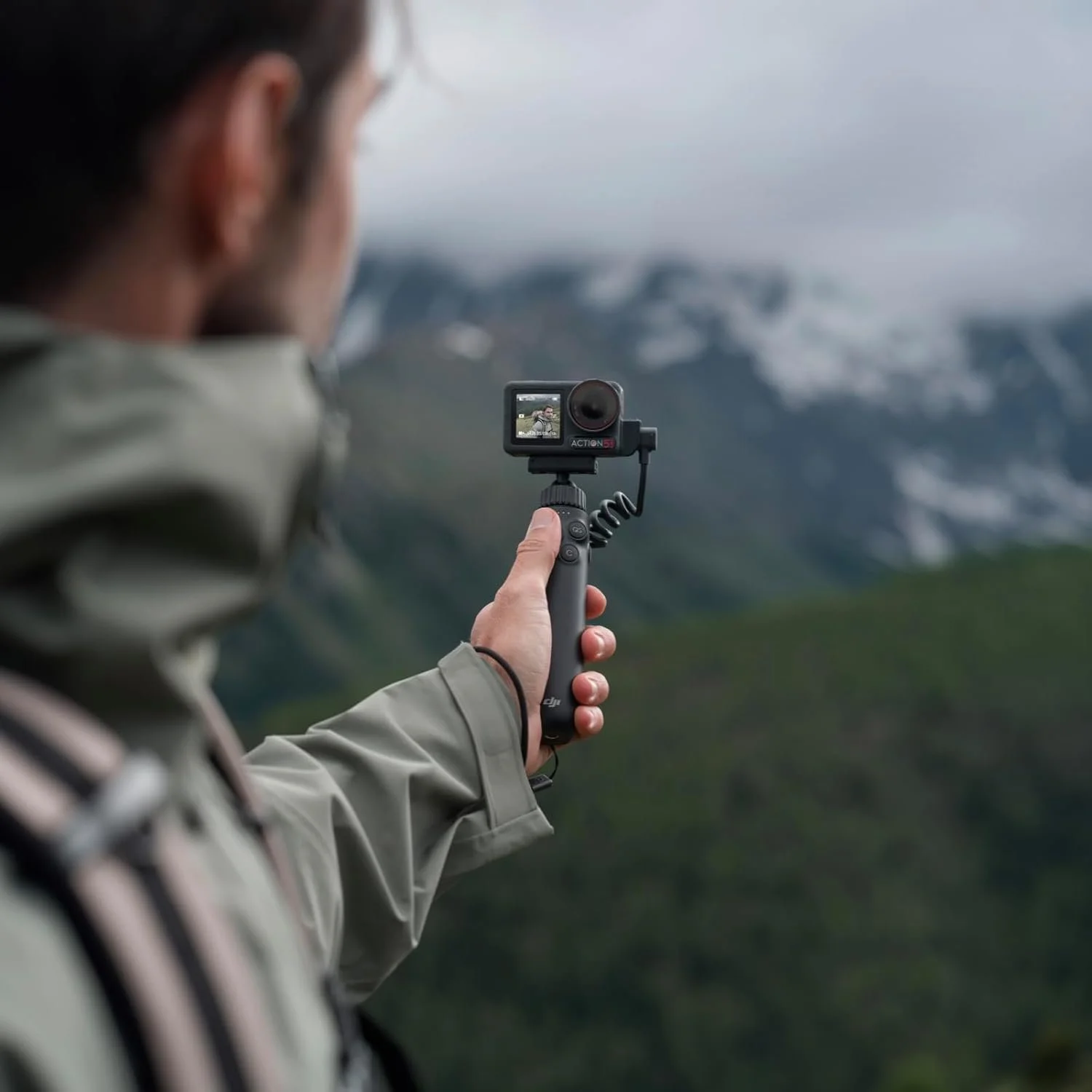 Многофункциональная зарядная ручка DJI Osmo Action совместима с Action 5 Pro/Action 4 Черный, фото №5 Многофункциональная зарядная ручка DJI Osmo Action совместима с Action 5 Pro/Action 4 Черный, фото №5