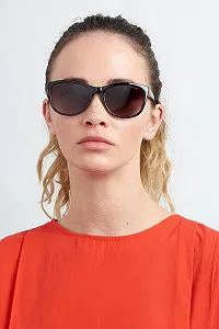 Солнцезащитные очки Polaroid круглые P8339, женские synthetic.ua - Фото 1