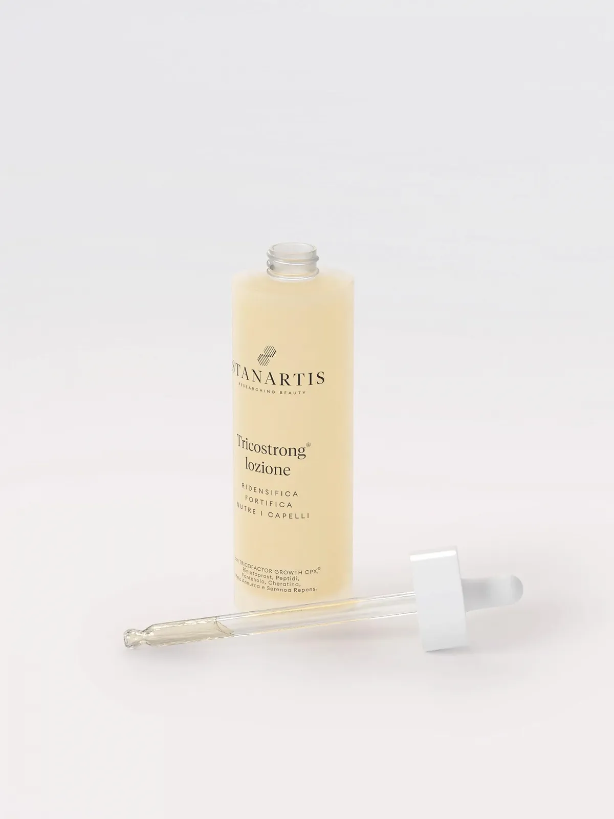 Лосьйон проти випадіння волосся Tricostrong Stanartis 100 мл, фото №4