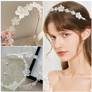 Набор из 2 женских аксессуаров для волос с цветами. synthetic.ua - Фото 1