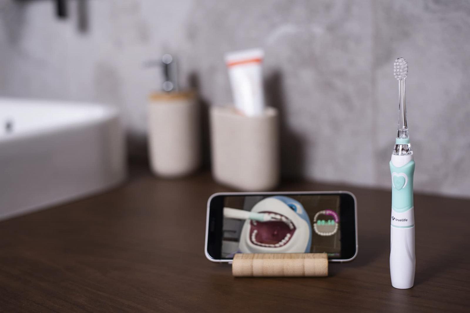 Звукова зубна щітка TrueLife SonicBrush Kid G для дітей 5-9 років таймер м'яка щетина 30 наклейок LED-підсвічування на батарейках компактний дизайн, фото №8