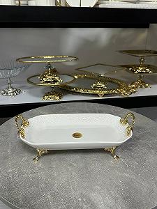 Блюдо з порцеляни поглиблене на чотьох золотих ніжках з ручками ціна на synthetic.ua - Фото 1 Блюдо з порцеляни поглиблене на чотьох золотих ніжках з ручками synthetic.ua - Фото 1