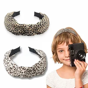 Купити Обруч на голову Вузол Леопардовий принт - Фото 1 Обруч на голову Вузол Леопардовий принт - Фото 1